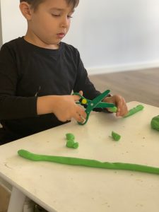 Scissor Skills Practice with Play Dough