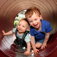 Children playing together showing the benefits of playgroup and how it is great for development