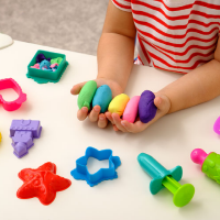 Scissor Skill Practice: Cutting Playdough - Playgroup WA